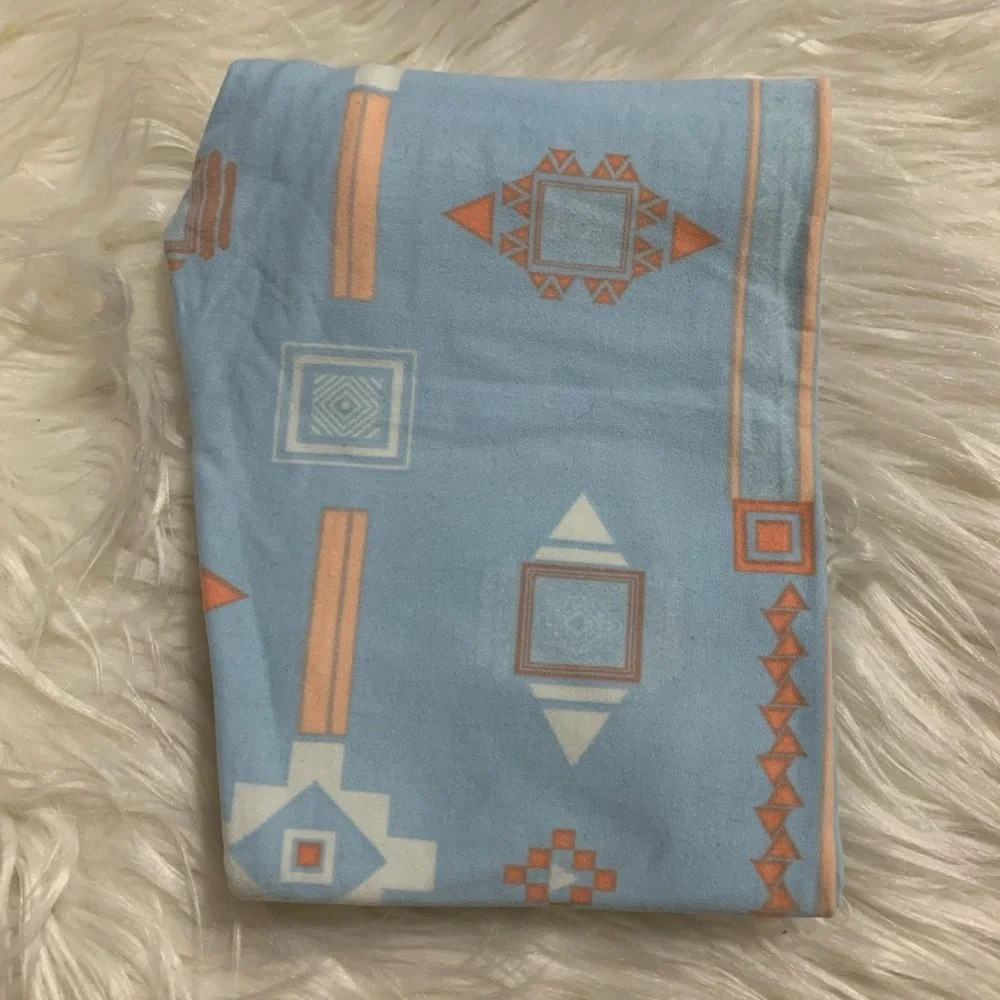 New! Girl’s Lularoe light blue Aztec print leggings L/XL